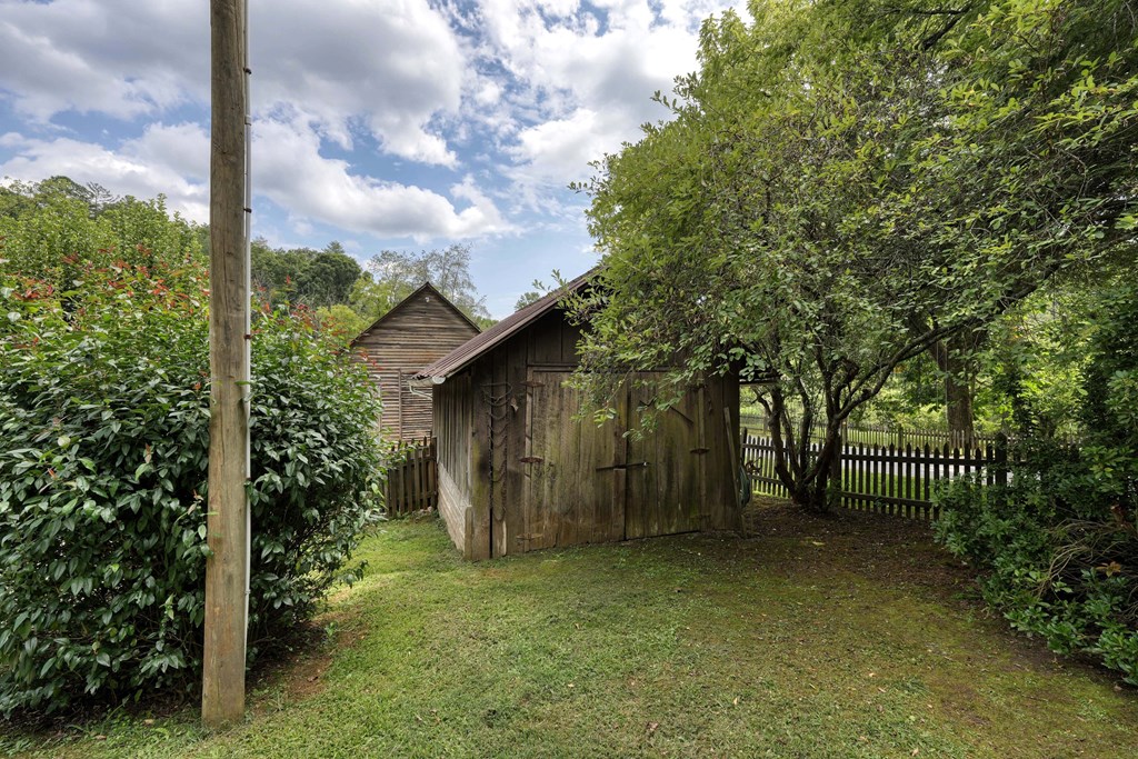 2350 Dial Road Blue Ridge, GA 30513 - Photo 51 of 76 a backyard of a house with lots of green space