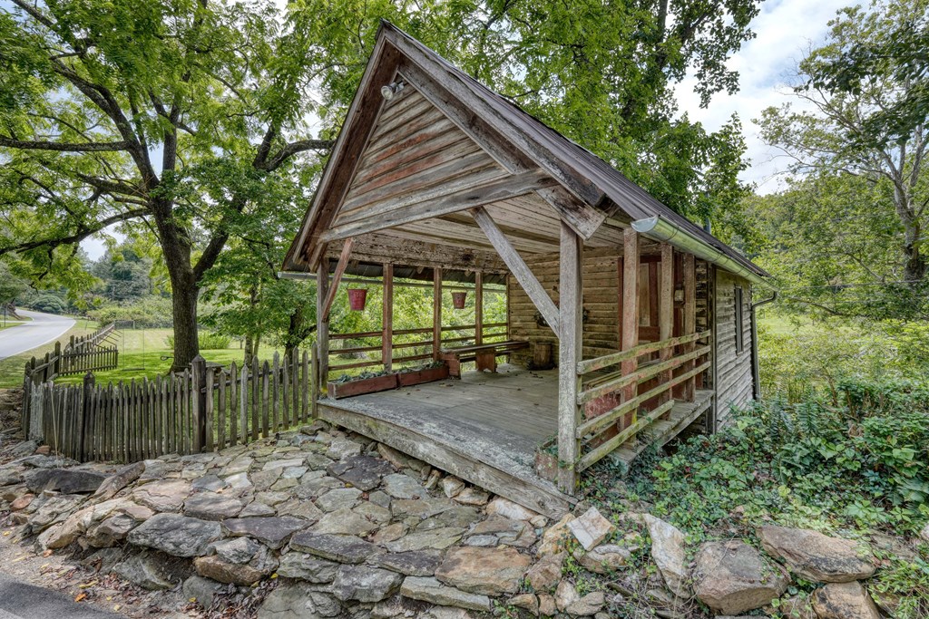 2350 Dial Road Blue Ridge, GA 30513 - Photo 60 of 76 a view of a house with backyard and trees