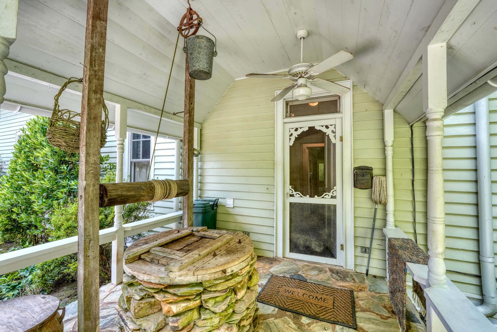 2350 Dial Road Blue Ridge, GA 30513 - Photo 9 of 76 a front view of a house with wooden floor and windows