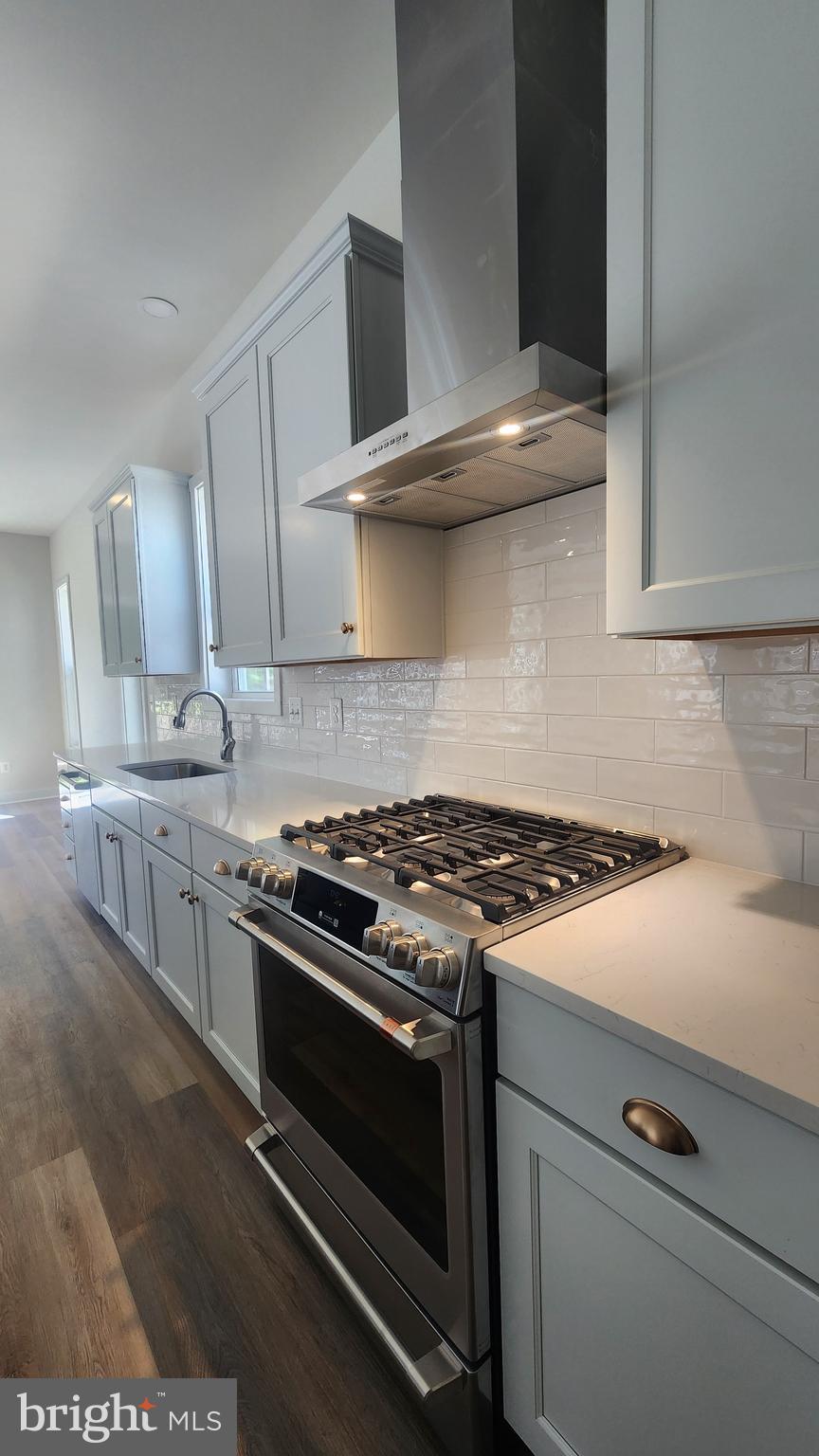 126 Sadie Way Arnold, MD 21012 - Photo 14 of 41 a stove top oven sitting inside of a kitchen