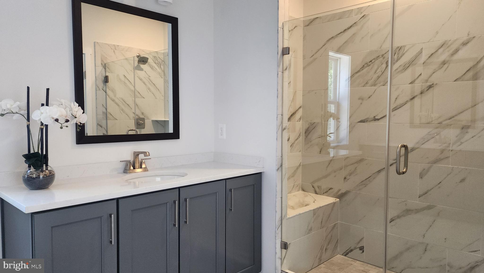 126 Sadie Way Arnold, MD 21012 - Photo 20 of 41 a bathroom with a double vanity sink mirror and shower
