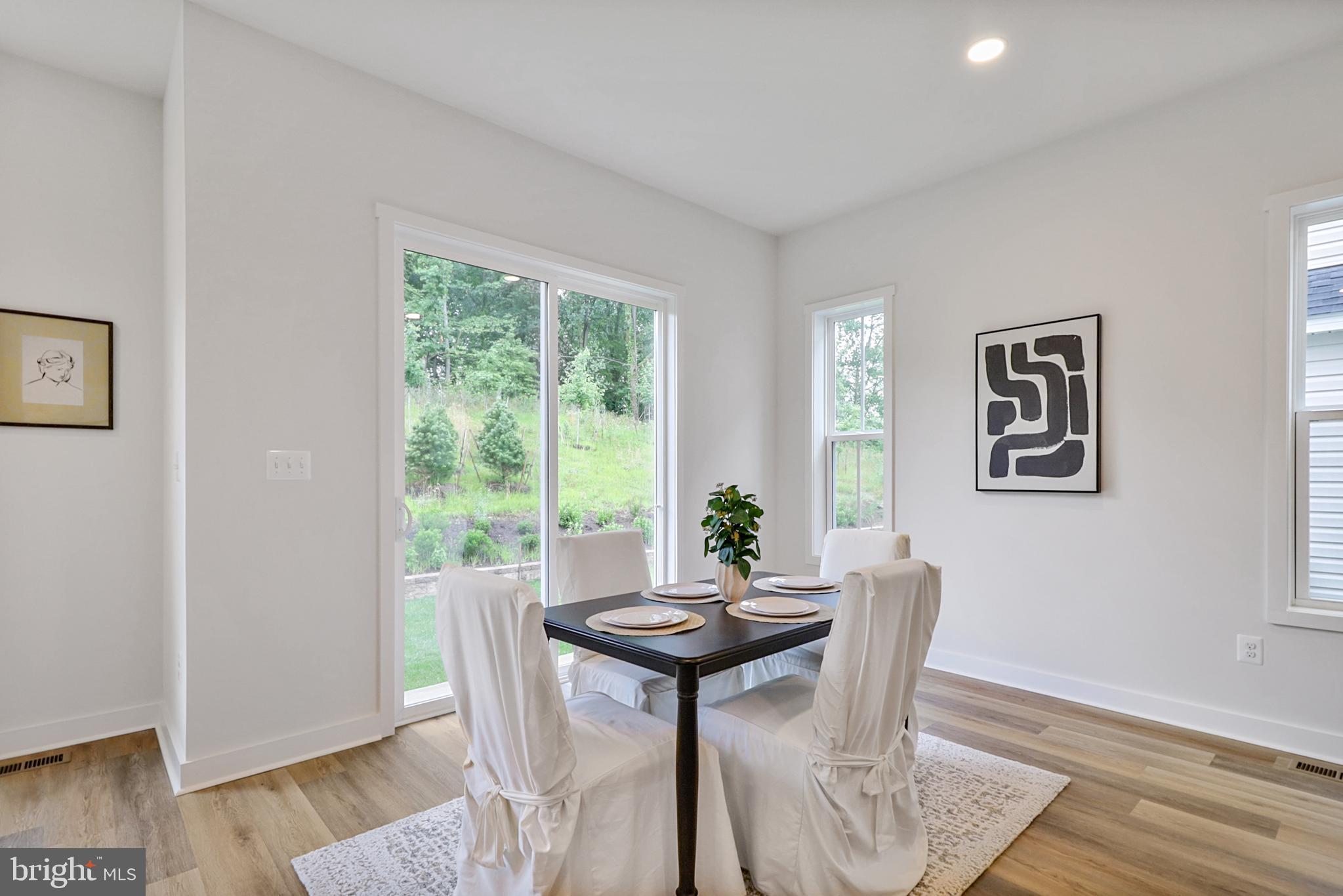 126 Sadie Way Arnold, MD 21012 - Photo 4 of 41 a view of a livingroom with furniture and wooden floor