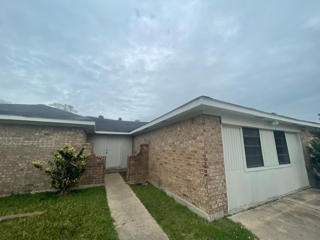 12779 Enchanted Path Drive Houston, TX 77044 - Photo 1 of 11 a backyard of a house with lots of green space