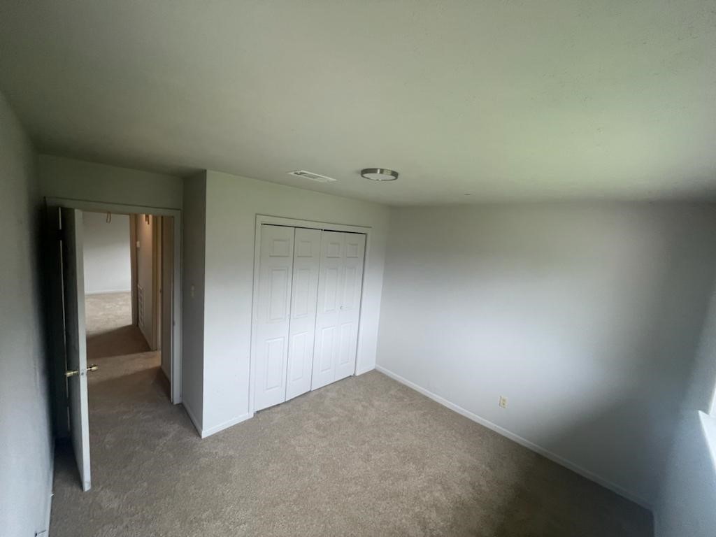 12779 Enchanted Path Drive Houston, TX 77044 - Photo 8 of 11 an empty room with closet