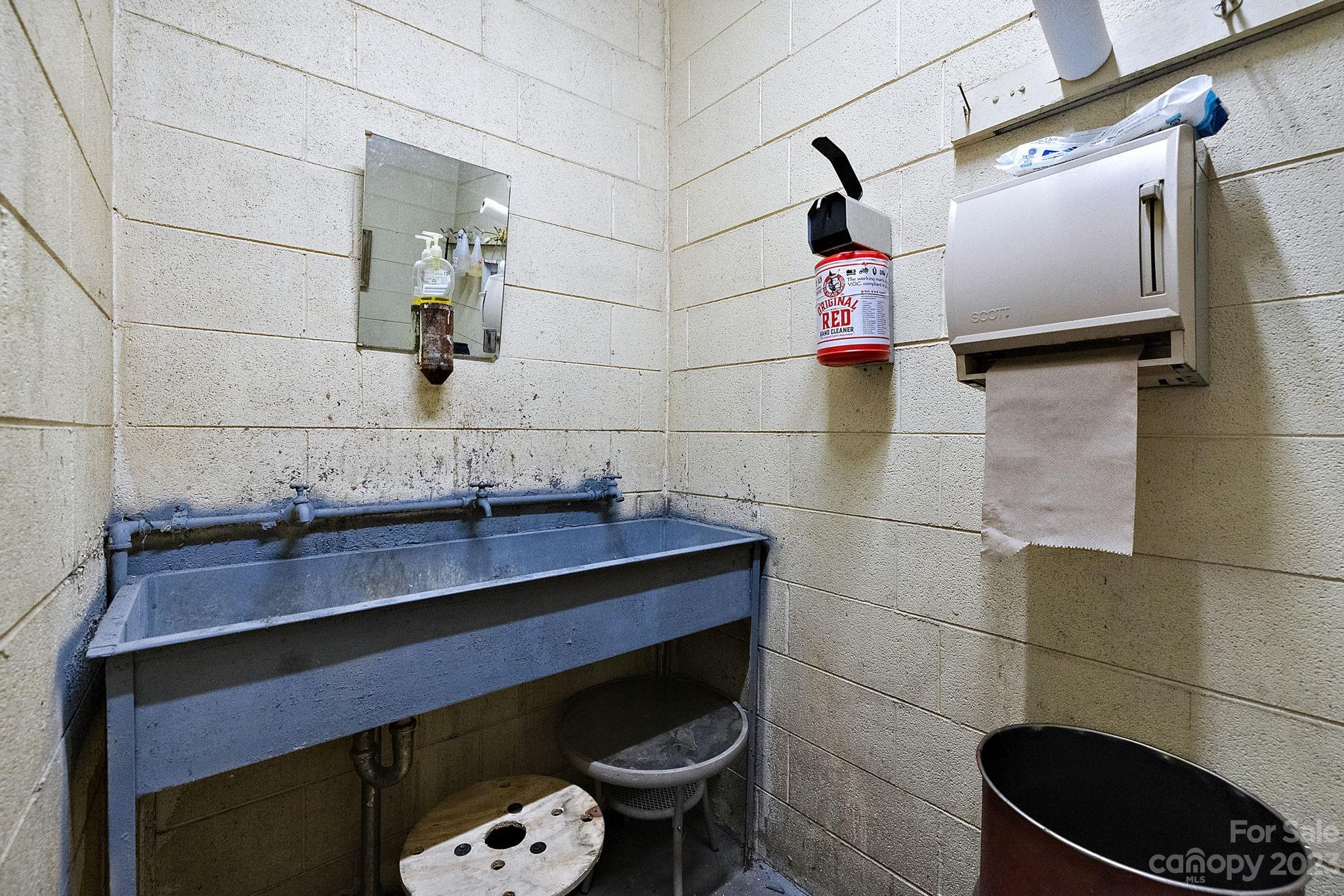 1353 Miles Road Dallas, NC 28034 - Photo 21 of 41 a bathroom with a sink and a mirror