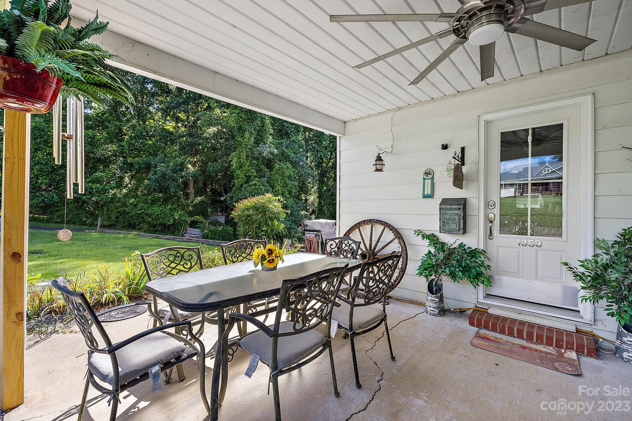 1353 Miles Road Dallas, NC 28034 - Photo 4 of 41 a view of an outdoor sitting area with furniture and garden view