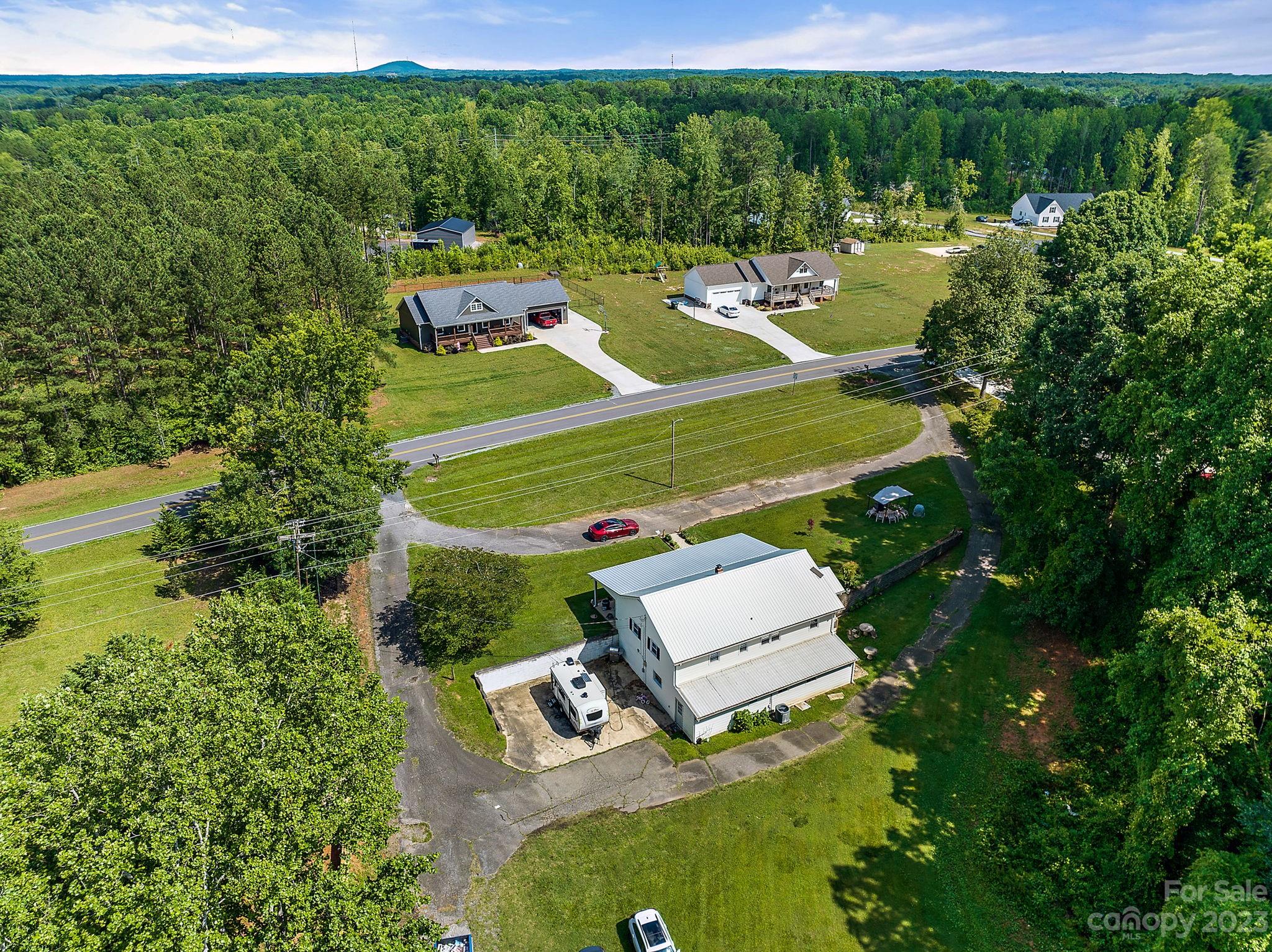 1353 Miles Road Dallas, NC 28034 - Photo 41 of 41 an aerial view of a house with a yard basket ball court and outdoor seating