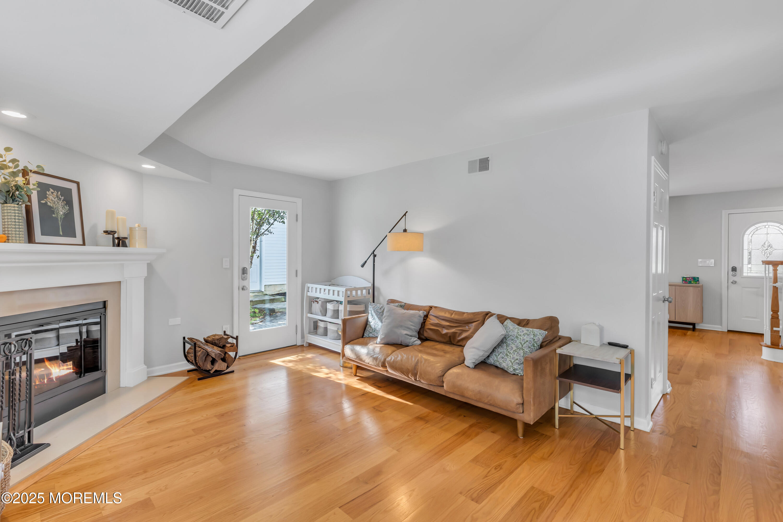 8 Allston Street Red Bank, NJ 07701 - Photo 13 of 64 a living room with furniture and a fireplace