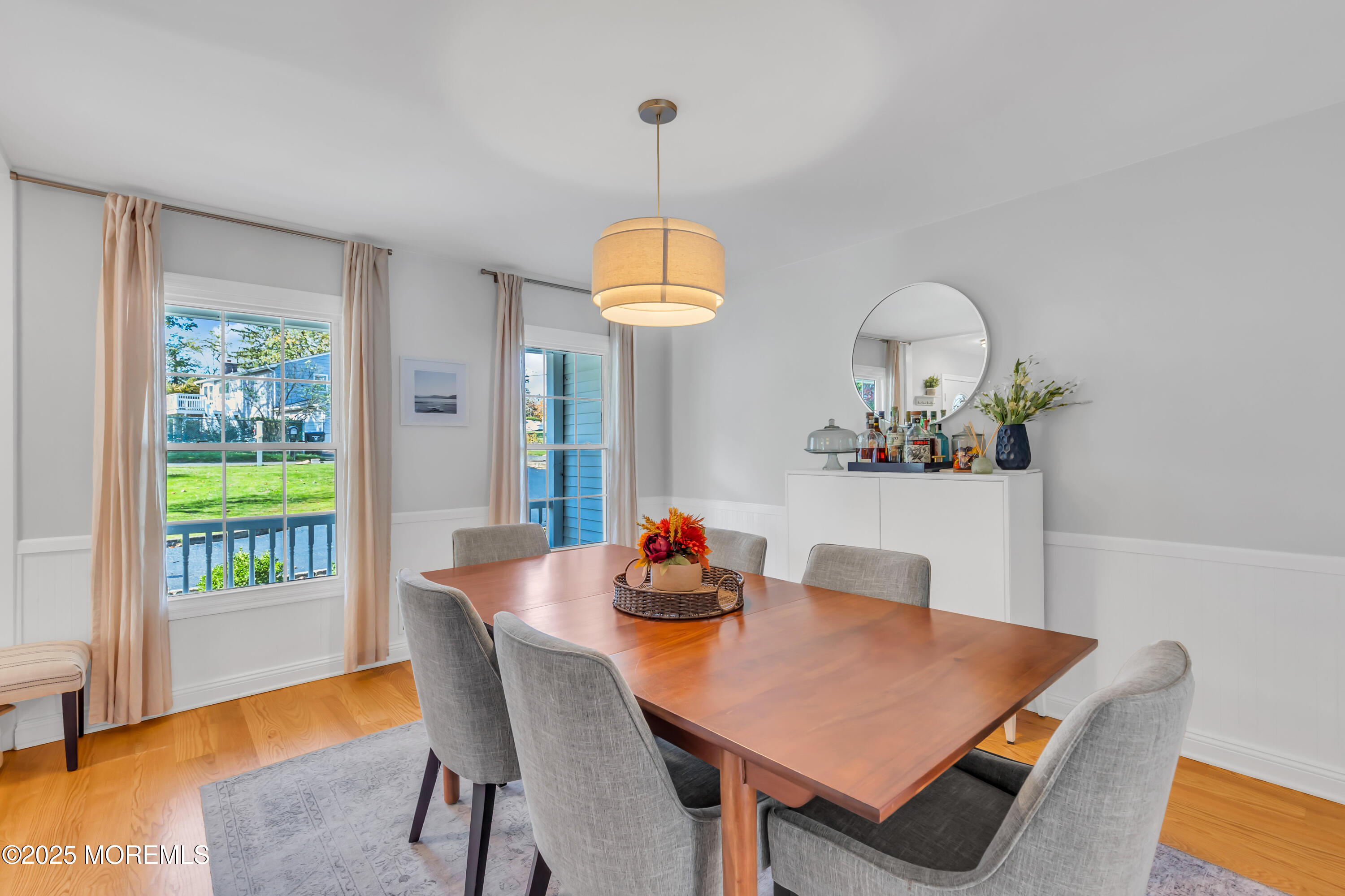 8 Allston Street Red Bank, NJ 07701 - Photo 29 of 64 a view of a dining room with furniture window and wooden floor