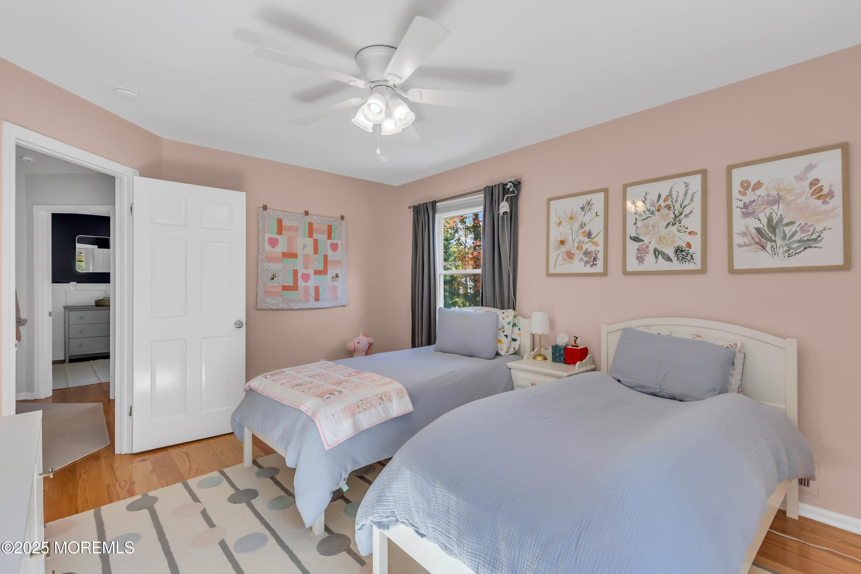 8 Allston Street Red Bank, NJ 07701 - Photo 32 of 64 a bedroom with two beds and a chandelier