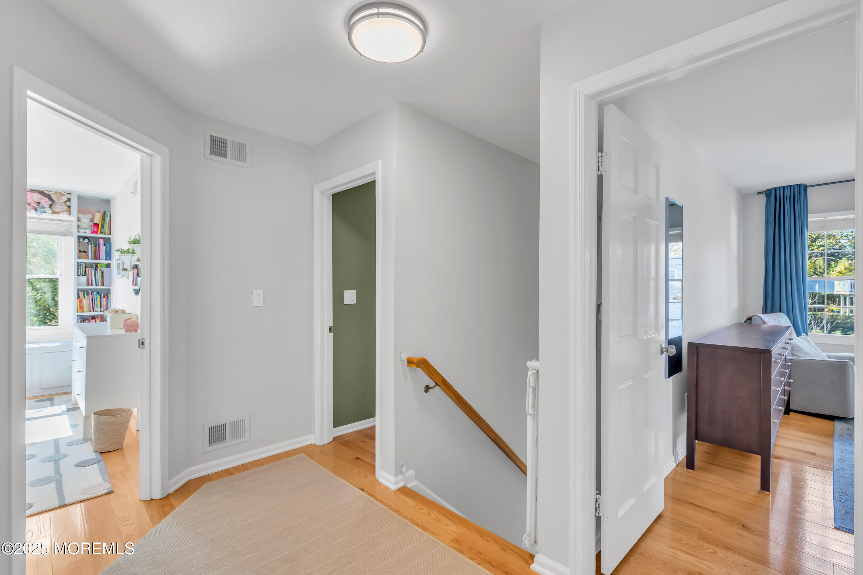8 Allston Street Red Bank, NJ 07701 - Photo 37 of 64 a view of a hallway with bathroom and wooden floor