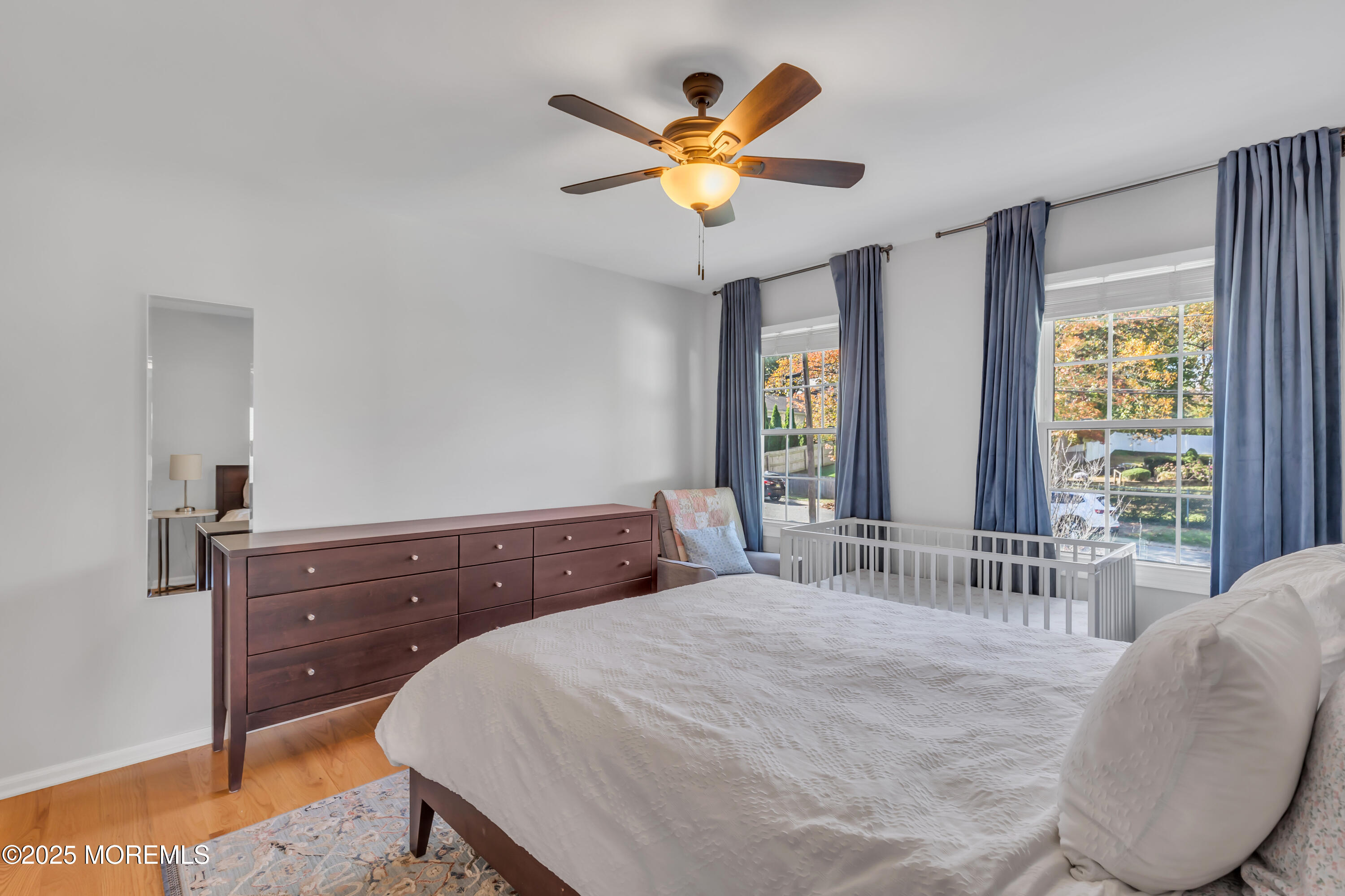 8 Allston Street Red Bank, NJ 07701 - Photo 39 of 64 a bedroom with a large bed and a large window