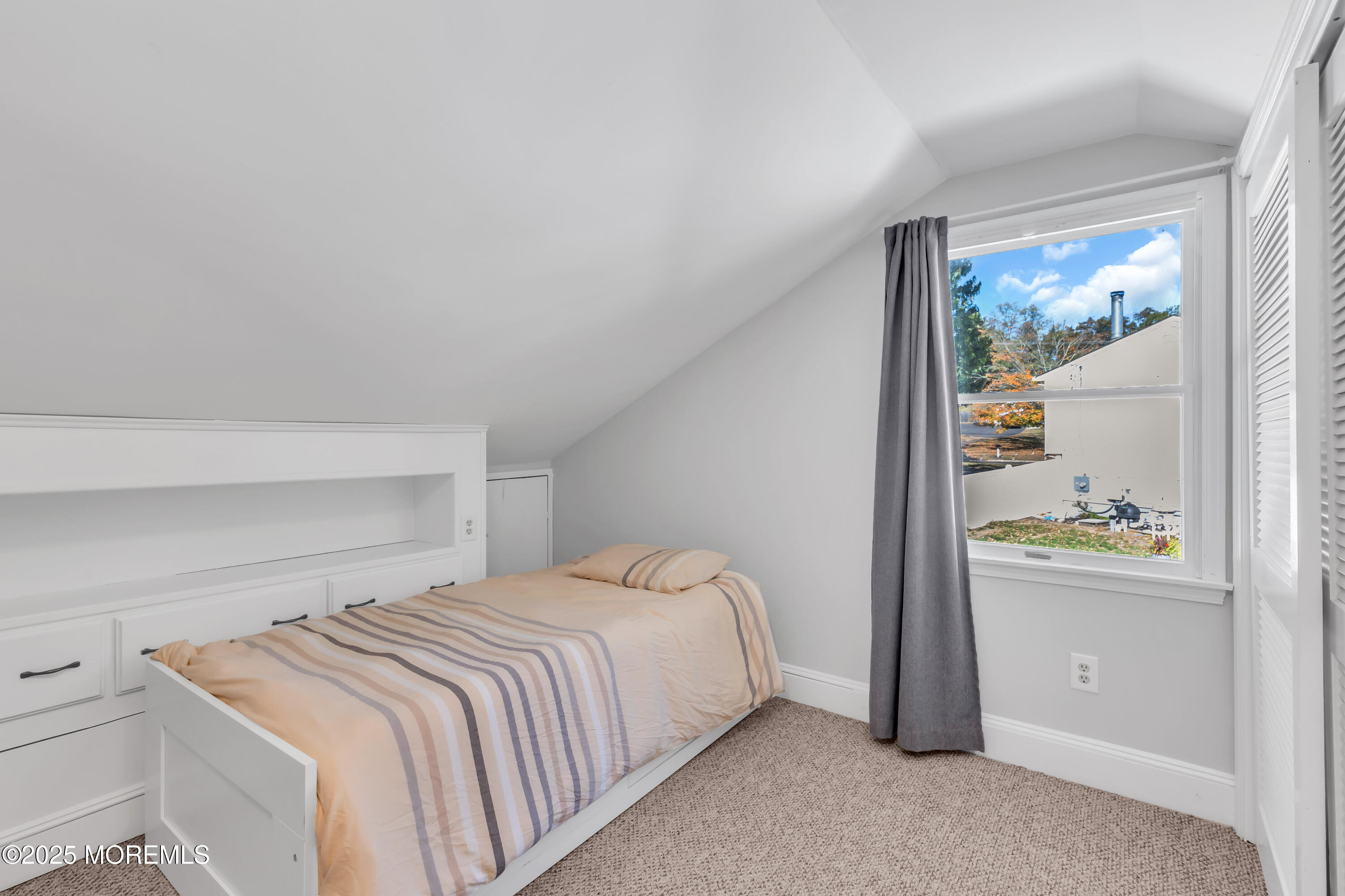 8 Allston Street Red Bank, NJ 07701 - Photo 40 of 64 a bedroom with a bed and a painting on the wall