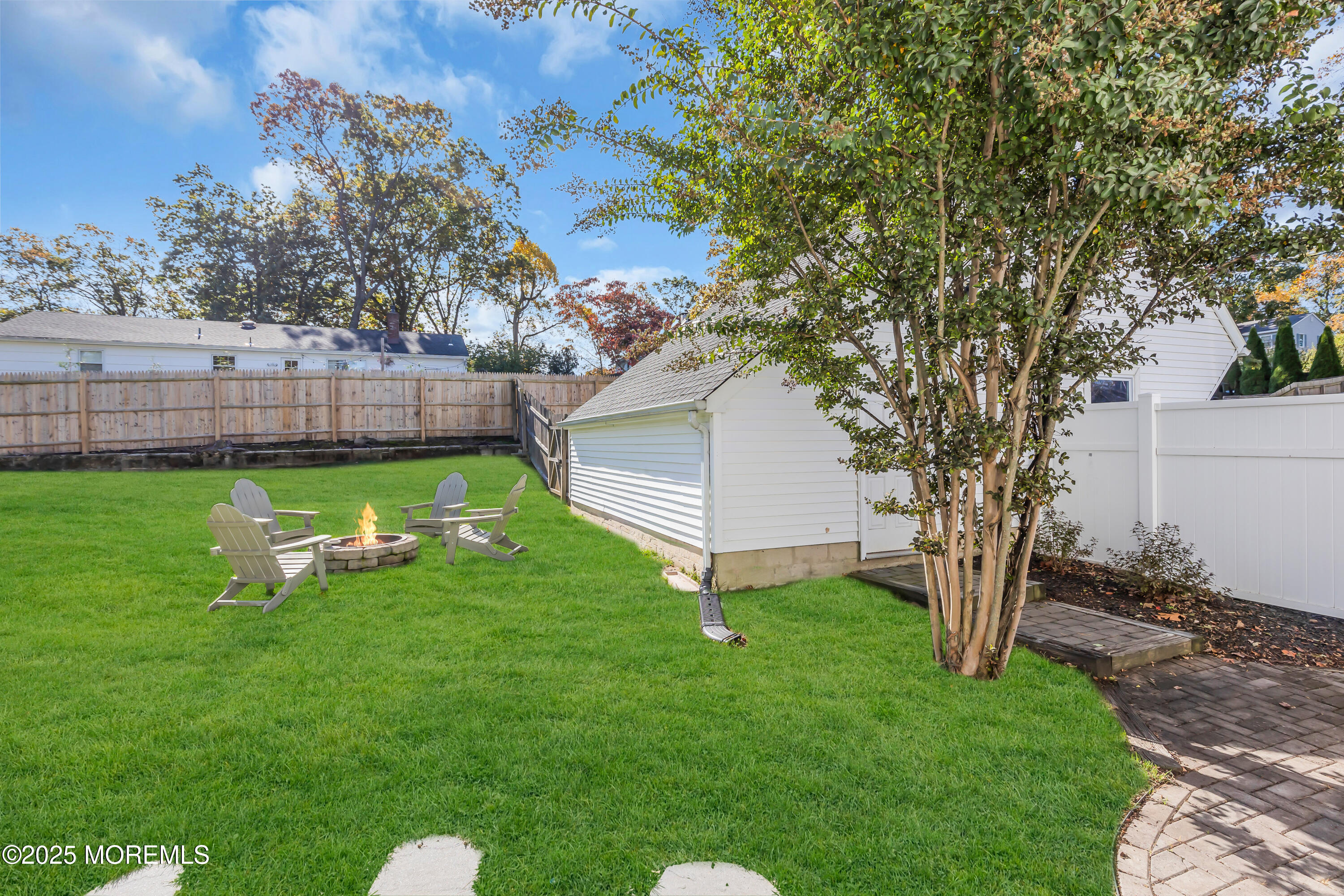 8 Allston Street Red Bank, NJ 07701 - Photo 47 of 64 a view of a backyard with a garden