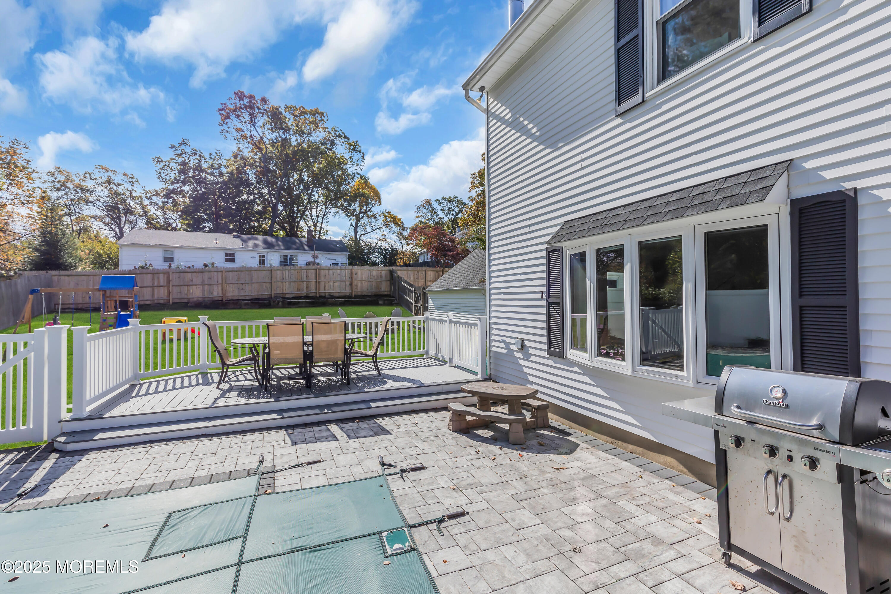 8 Allston Street Red Bank, NJ 07701 - Photo 60 of 64 a view of a chairs and a table in the patio