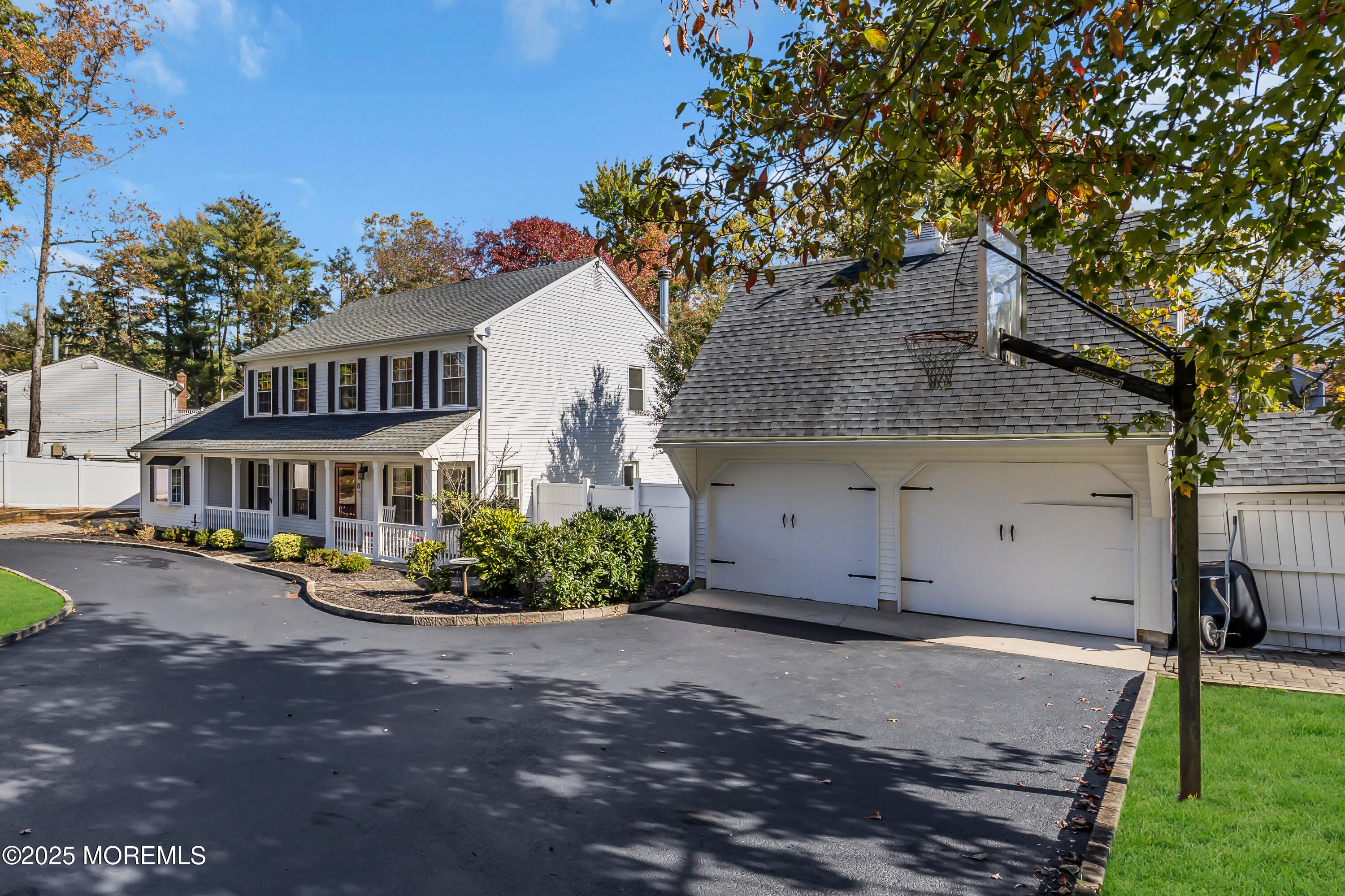 8 Allston Street Red Bank, NJ 07701 - Photo 6 of 64 a front view of a house with a garden