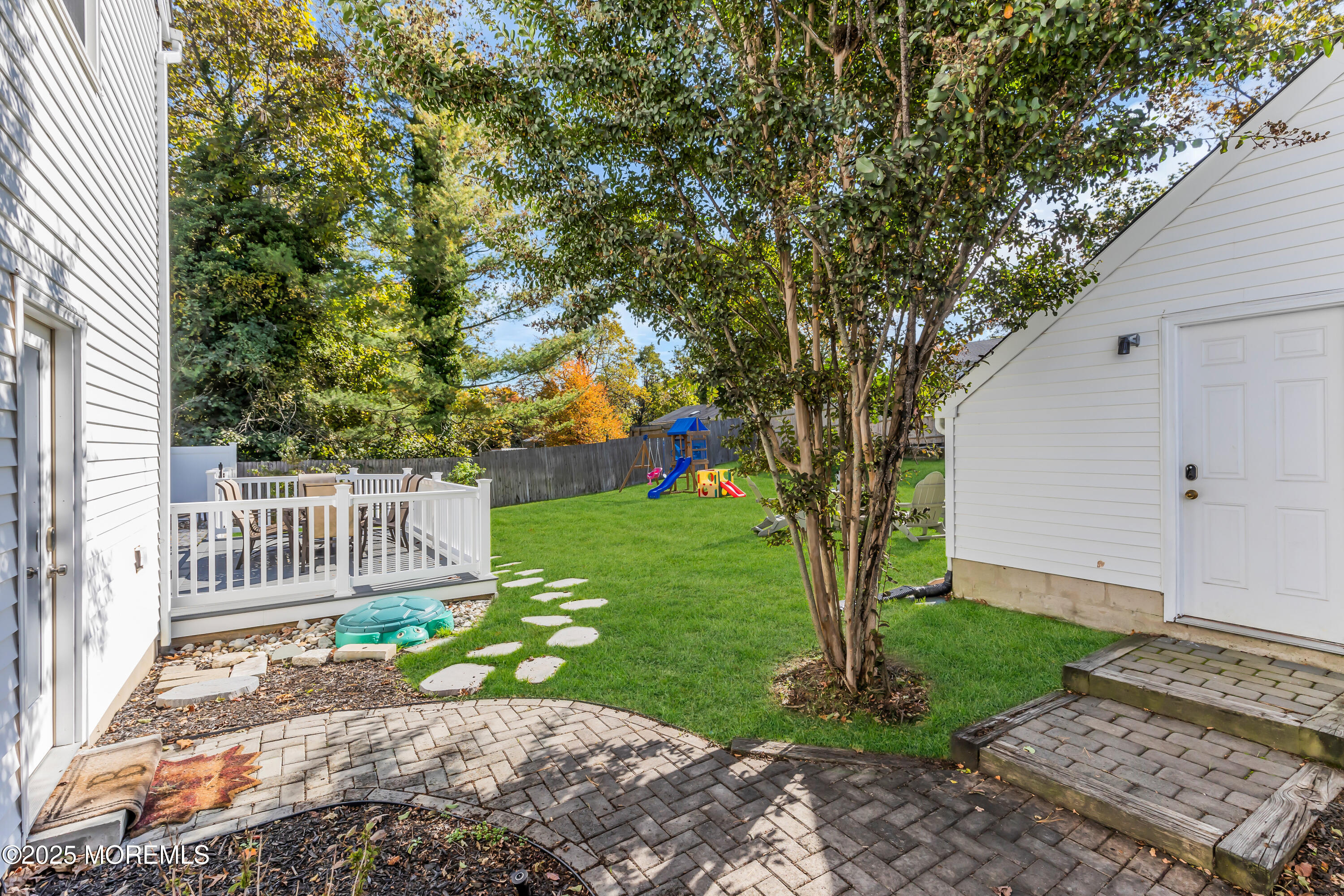 8 Allston Street Red Bank, NJ 07701 - Photo 63 of 64 a front view of a house with garden