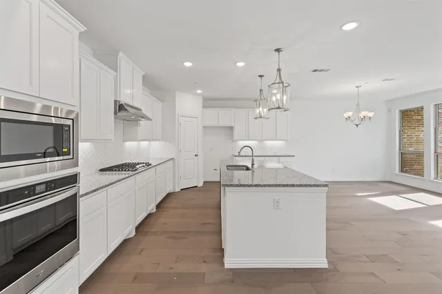 a view of livingroom with kitchen