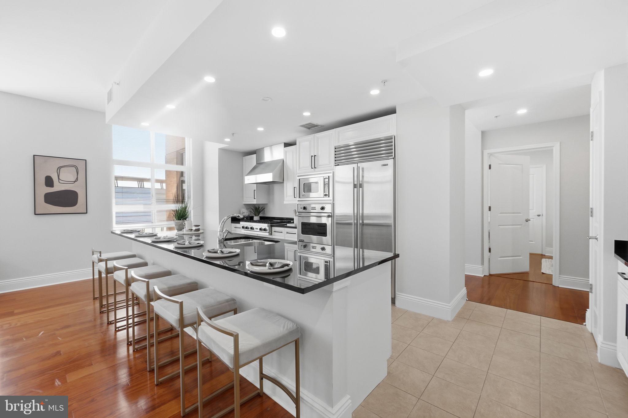 11990 Market Street, Unit 2103 Reston, VA 20190 - Photo 11 of 78 Sleek modern kitchen with ocean views.