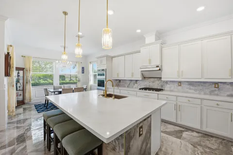 $980,000 | 984 Sterling Pine Place, Loxahatchee, FL 33470