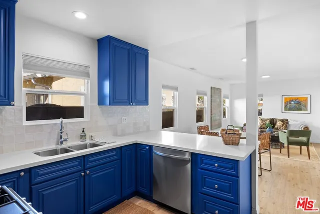 a bed room with a bed and chair