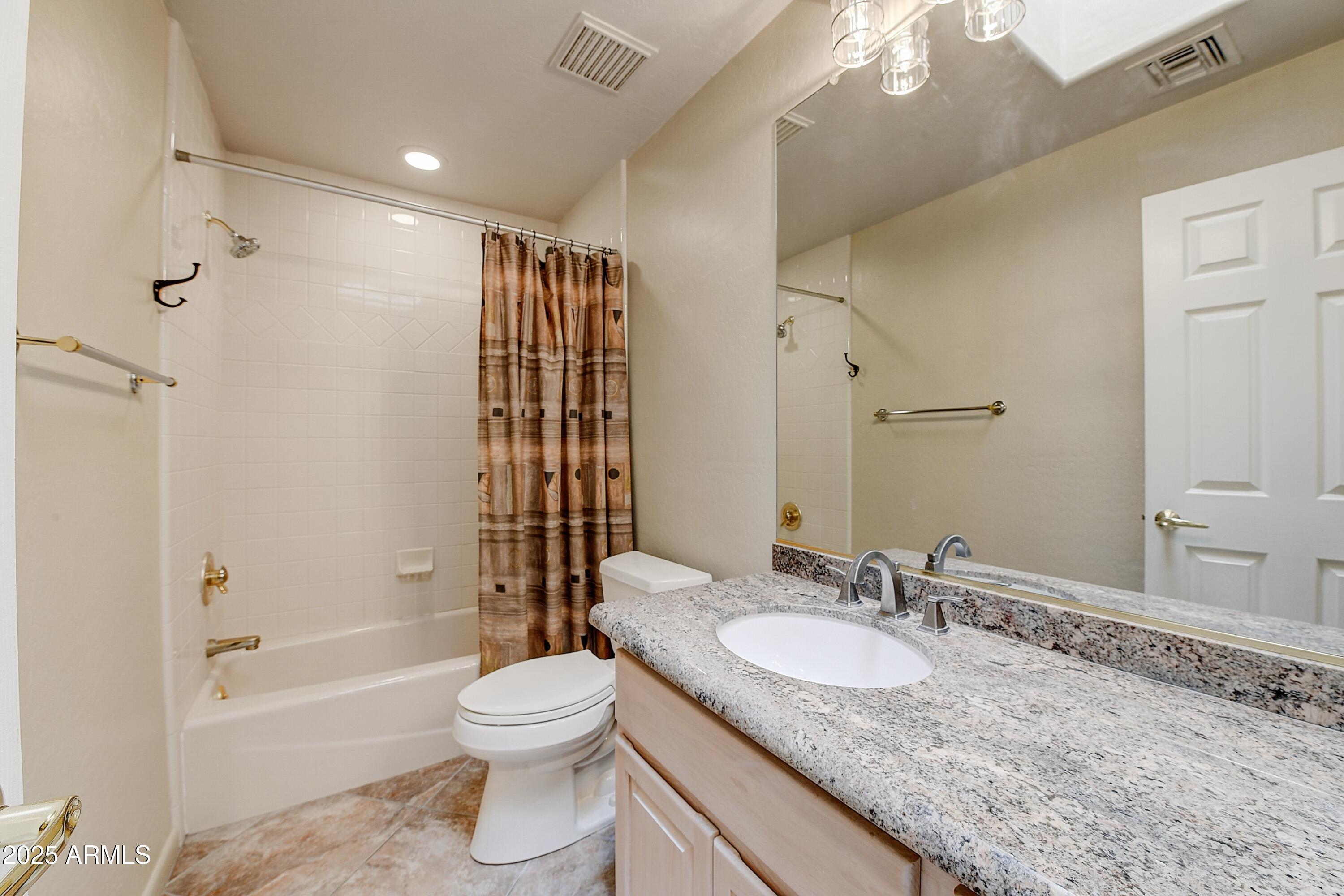 27502 North Azatlan Drive Rio Verde, AZ 85263 - Photo 13 of 21 a bathroom with a granite countertop sink toilet and shower