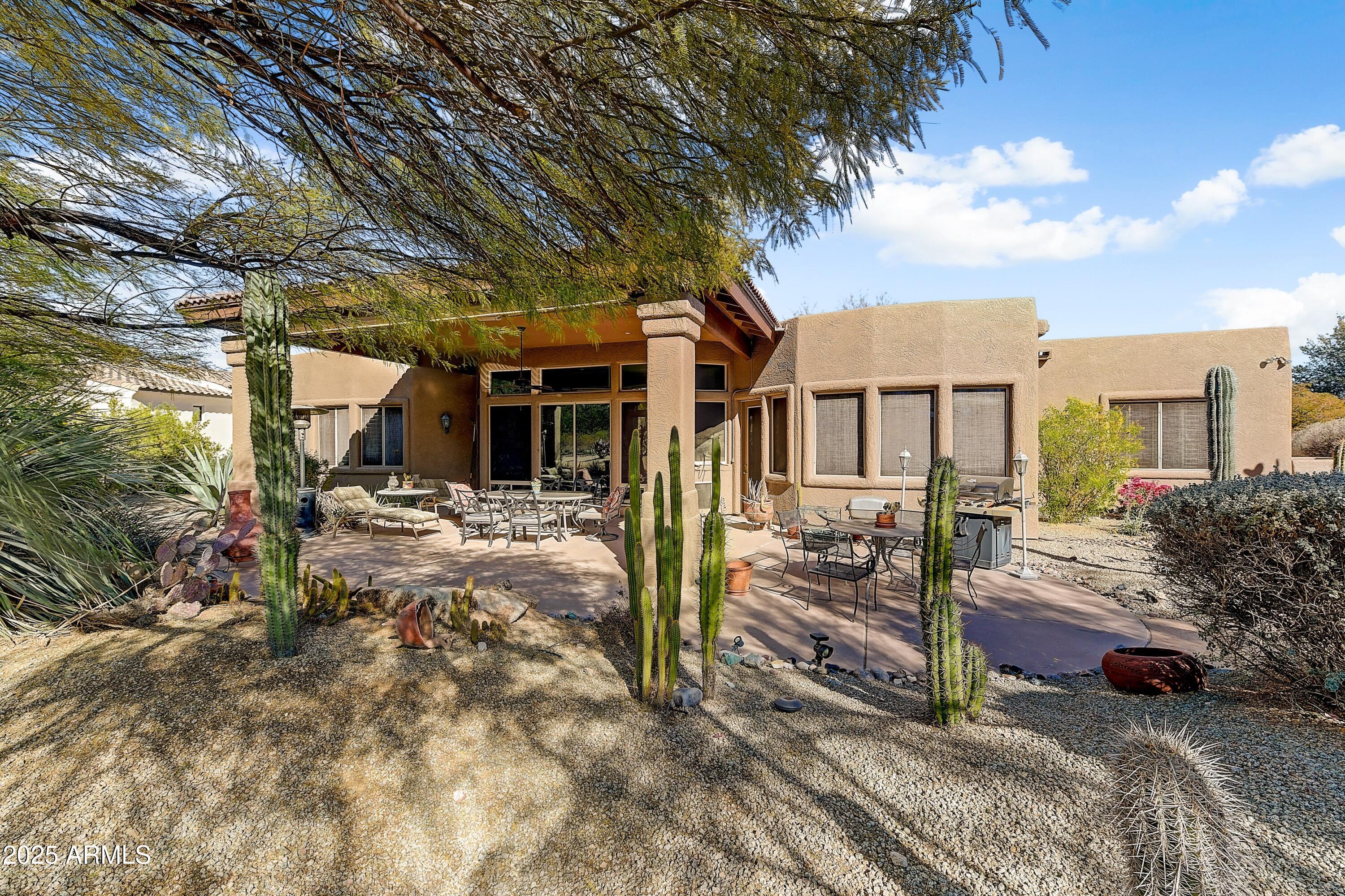 27502 North Azatlan Drive Rio Verde, AZ 85263 - Photo 17 of 21 a view of a house with a yard