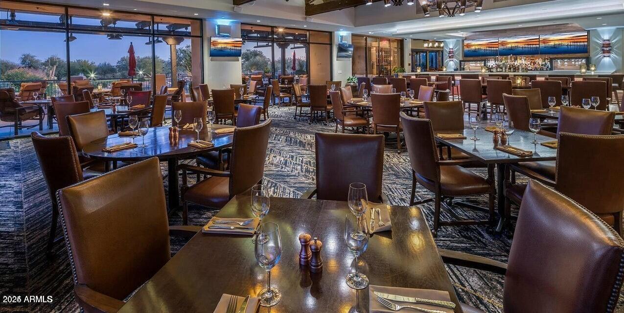 27502 North Azatlan Drive Rio Verde, AZ 85263 - Photo 19 of 21 a view of a dining room with furniture