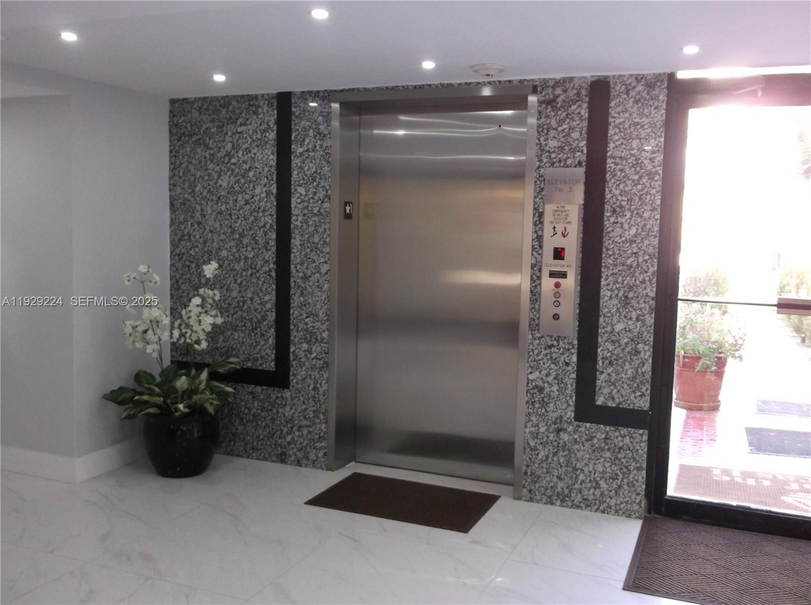 16919 North Bay Road, Unit 214 Sunny Isles Beach, FL 33160 - Photo 15 of 42 a bathroom with a shower