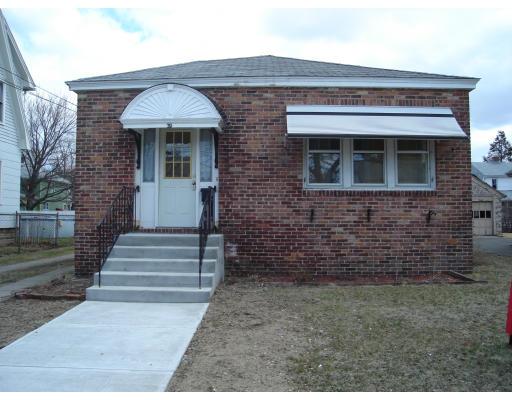 29 Carew Terrace Springfield, MA 01104 - Photo 1 of 11 a front view of a house with a yard