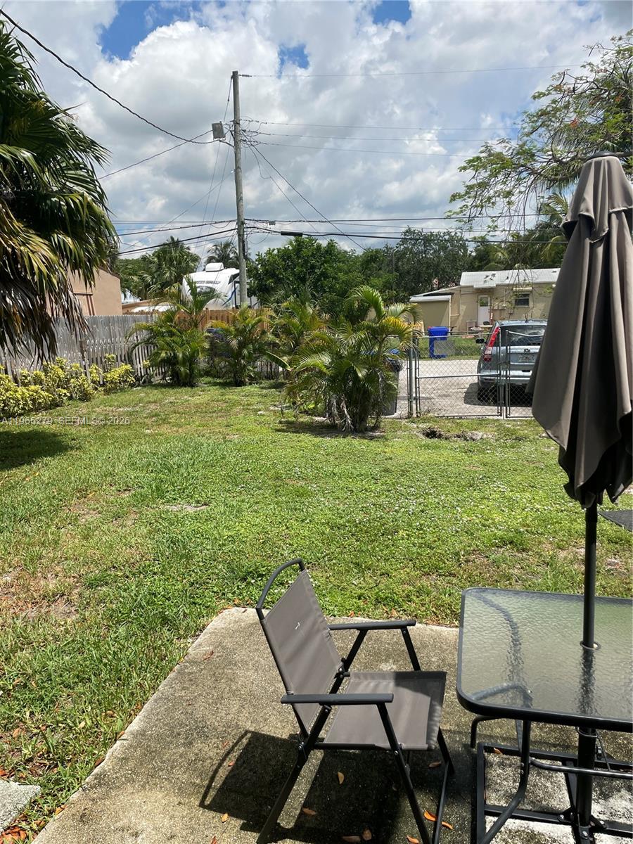 1913 Harding Street Hollywood, FL 33020 - Photo 8 of 9 a view of yard with patio