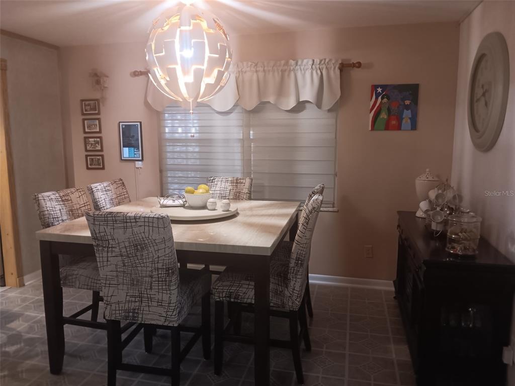 833 Channing Road Lakeland, FL 33805 - Photo 6 of 16 a view of a dining room with furniture