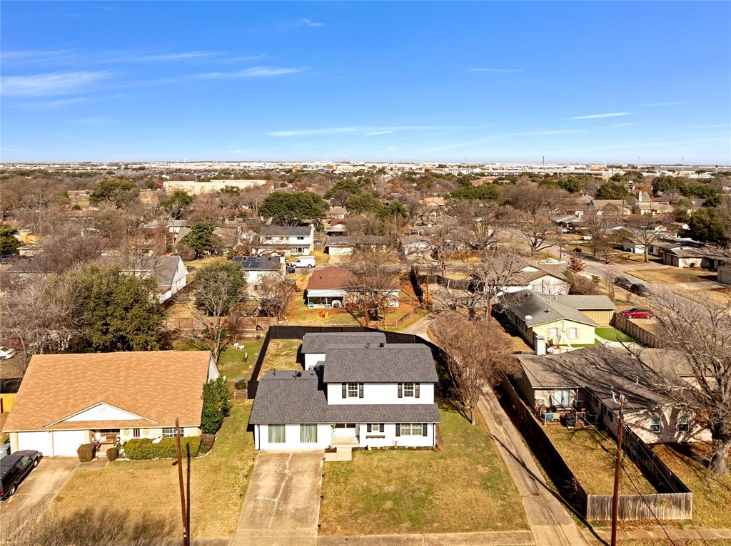 8635 Strathmore Drive Dallas, TX 75238 - Photo 29 of 35 an aerial view of residential houses with outdoor space