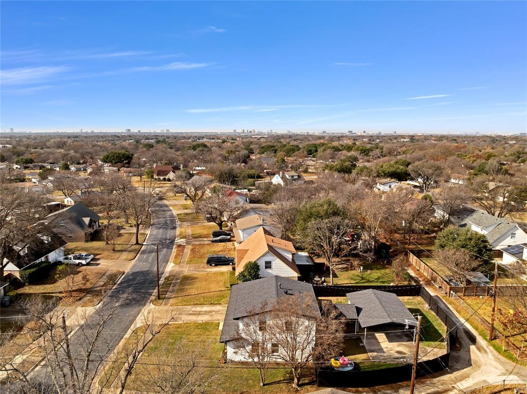 8635 Strathmore Drive Dallas, TX 75238 - Photo 33 of 35 an aerial view of residential houses with city view