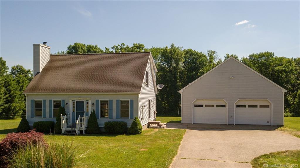 580 Waterman Road Lebanon, CT 06249 - Photo 1 of 1 a front view of a house with a yard