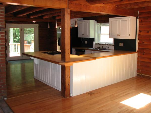 64 Baker Road Salisbury, MA 01952 - Photo 11 of 29 a kitchen with stainless steel appliances granite countertop a stove a sink and a microwave