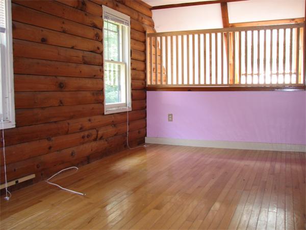 64 Baker Road Salisbury, MA 01952 - Photo 21 of 29 an empty room with wooden floor and windows