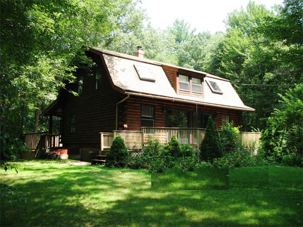 64 Baker Road Salisbury, MA 01952 - Photo 3 of 29 a front view of a house with a yard