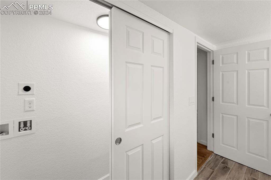 2615 East Boulder Street Colorado Springs, CO 80909 - Photo 32 of 50 a view of a hallway