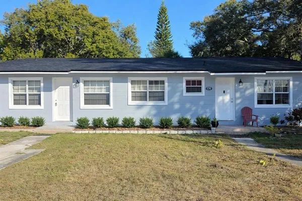 front view of house with a yard
