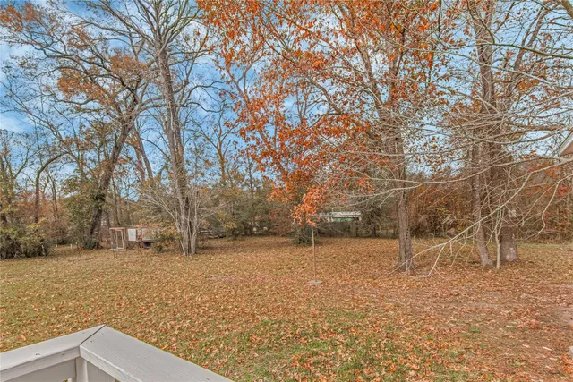 a view of yard covered with snow
