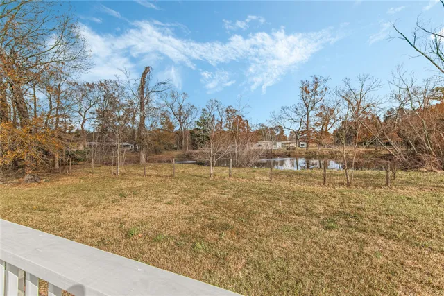 a view of a yard with an outdoor space