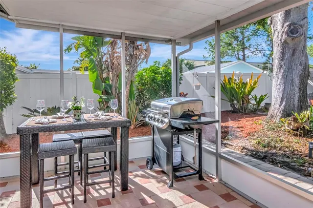 a view of a yard with a tree