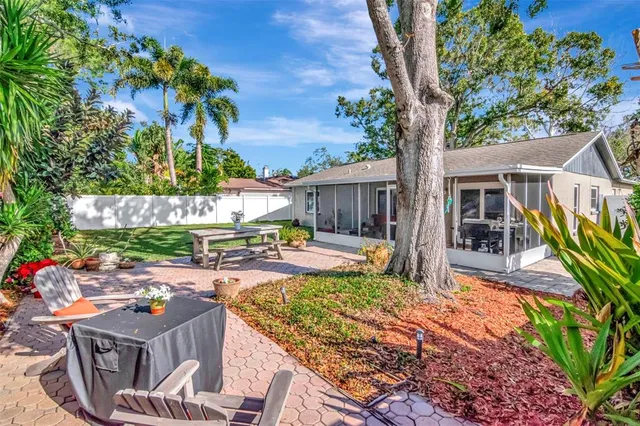 a view of a back yard of the house