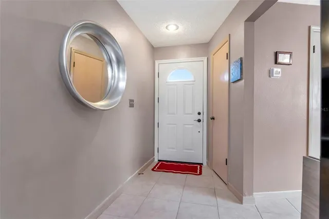 a bathroom with a mirror and a shower