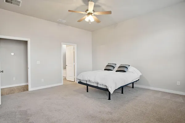 a living room with a couch and a flat screen tv