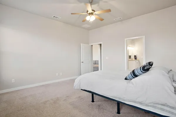 a view of a livingroom with wooden floor and closet