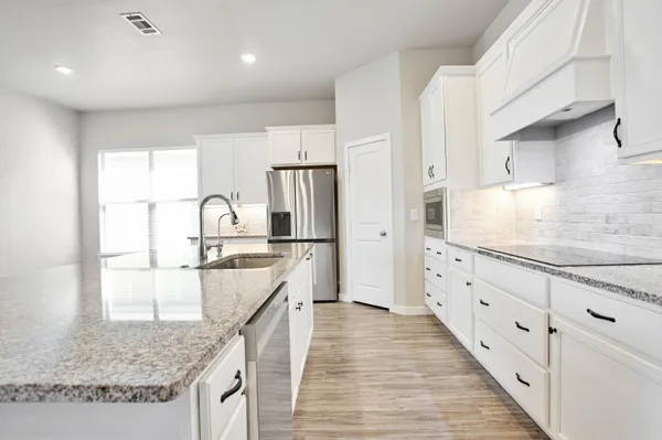 a living room with furniture fireplace and flat screen tv