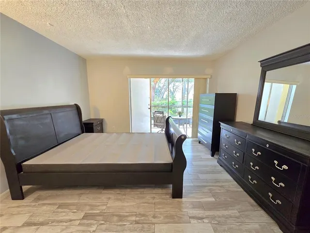 a room with a table and a mirror