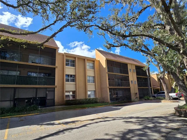 a house with a tree in front of it